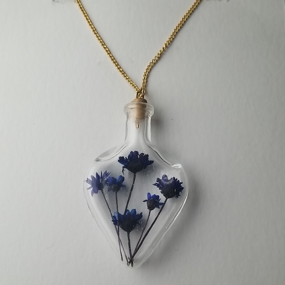 Resin Potion Pendant With Blue Flowers